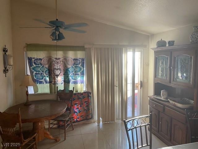5429 Chela Dr, Las Vegas, NV 89120 - dining space featuring a ceiling fan, light tile patterned flooring, and lofted ceiling