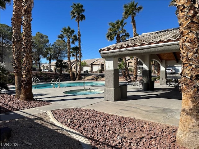 213 Luninborg St, Henderson, NV 89074 - community pool featuring a patio area