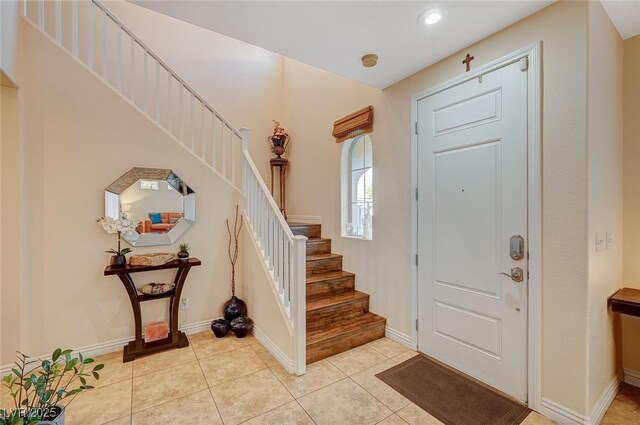 9715 Aleutian St, Las Vegas, NV 89178 - entrance foyer featuring stairs, light tile patterned floors, and recessed lighting