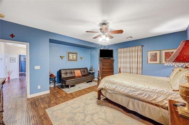 9715 Aleutian St, Las Vegas, NV 89178 - bedroom with wood finished floors and a ceiling fan