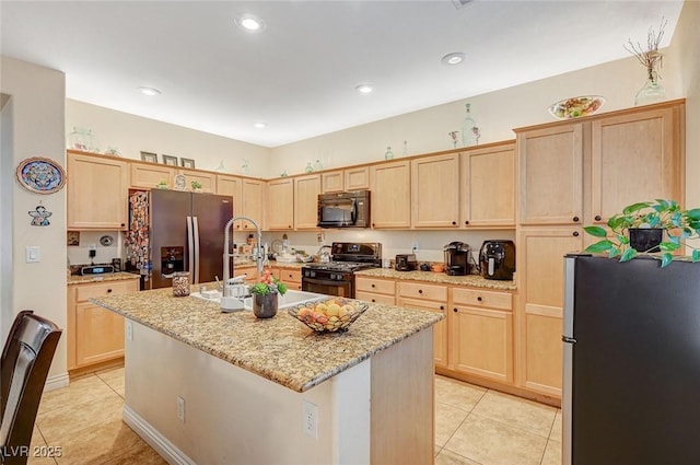 9715 Aleutian St, Las Vegas, NV 89178 - kitchen featuring black appliances, light brown cabinetry, light tile patterned floors, and recessed lighting