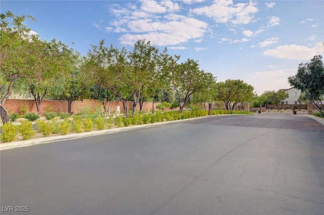 9715 Aleutian St, Las Vegas, NV 89178 - view of asphalt street with curbs and sidewalks