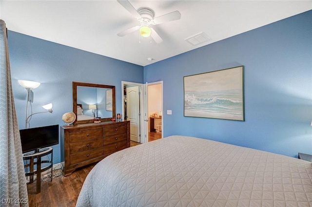 9715 Aleutian St, Las Vegas, NV 89178 - bedroom with dark wood finished floors and ceiling fan