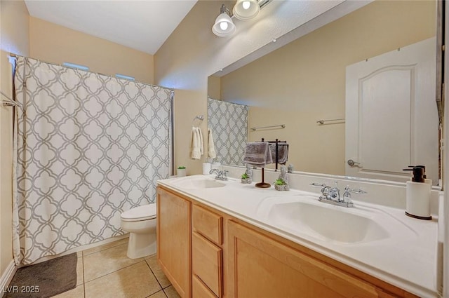 9715 Aleutian St, Las Vegas, NV 89178 - full bathroom with tile patterned floors and double vanity
