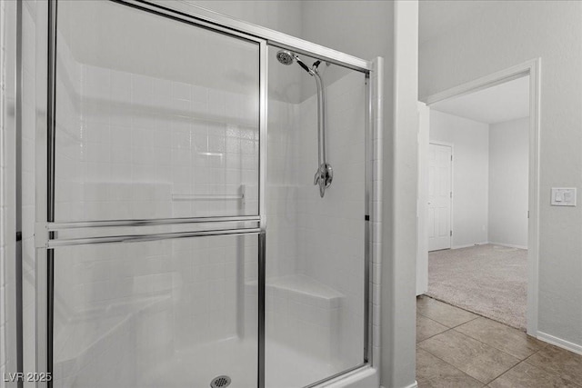 6868 Sky Pointe Dr Unit 2035, Las Vegas, NV 89131 - bathroom featuring a shower stall and tile patterned flooring