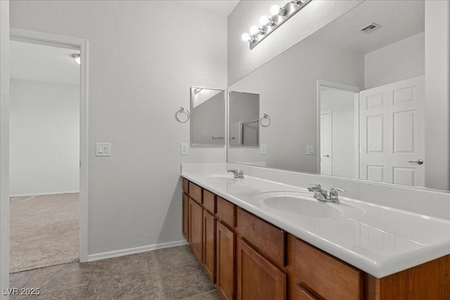 6868 Sky Pointe Dr Unit 2035, Las Vegas, NV 89131 - bathroom with double vanity and tile patterned flooring