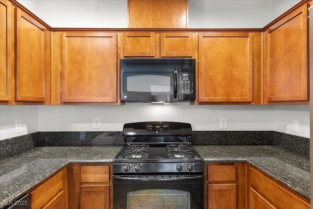 6868 Sky Pointe Dr Unit 2035, Las Vegas, NV 89131 - kitchen featuring black appliances, brown cabinetry, and dark stone countertops