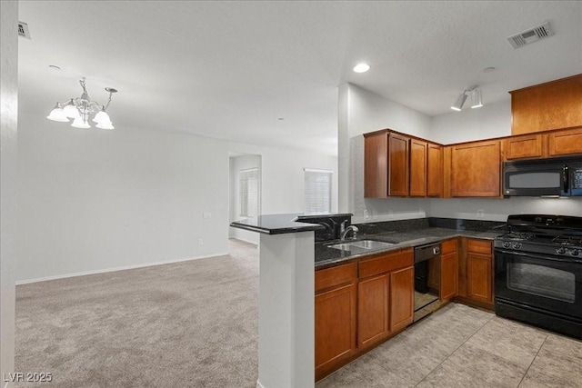 6868 Sky Pointe Dr Unit 2035, Las Vegas, NV 89131 - kitchen featuring black appliances, brown cabinets, a chandelier, light carpet, and a peninsula