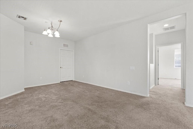 6868 Sky Pointe Dr Unit 2035, Las Vegas, NV 89131 - unfurnished room with carpet flooring and a chandelier