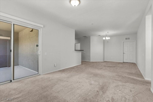 6868 Sky Pointe Dr Unit 2035, Las Vegas, NV 89131 - unfurnished living room with carpet flooring and a chandelier