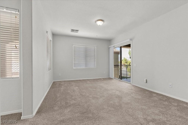 6868 Sky Pointe Dr Unit 2035, Las Vegas, NV 89131 - spare room featuring carpet flooring and baseboards