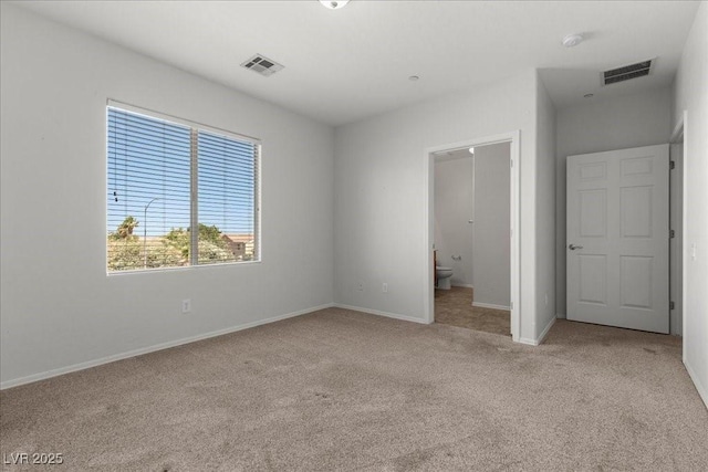 6868 Sky Pointe Dr Unit 2035, Las Vegas, NV 89131 - unfurnished bedroom with carpet floors and connected bathroom