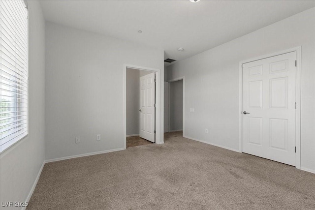 6868 Sky Pointe Dr Unit 2035, Las Vegas, NV 89131 - unfurnished bedroom with carpet floors and baseboards