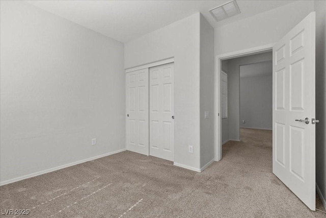 6868 Sky Pointe Dr Unit 2035, Las Vegas, NV 89131 - unfurnished bedroom featuring carpet floors and a closet