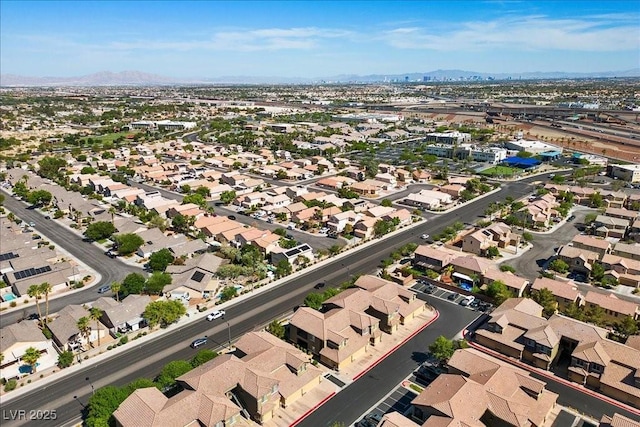 6868 Sky Pointe Dr Unit 2035, Las Vegas, NV 89131 - aerial view of property and surrounding area with a mountainous background and nearby suburban area