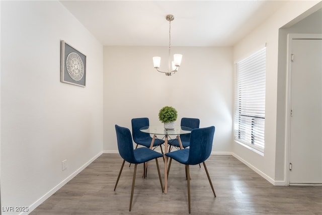 3151 Soaring Gulls Dr Unit 1021, Las Vegas, NV 89128 - dining room featuring wood finished floors and a chandelier