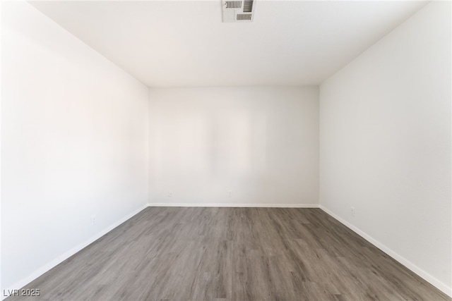 3151 Soaring Gulls Dr Unit 1021, Las Vegas, NV 89128 - unfurnished room featuring wood finished floors and baseboards