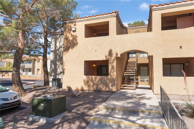 3151 Soaring Gulls Dr Unit 1021, Las Vegas, NV 89128 - view of building exterior with stairs