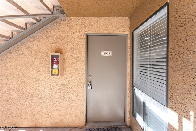 3151 Soaring Gulls Dr Unit 1021, Las Vegas, NV 89128 - doorway to property with stucco siding