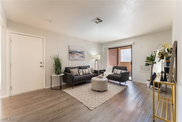 3151 Soaring Gulls Dr Unit 1021, Las Vegas, NV 89128 - living room featuring wood finished floors and baseboards
