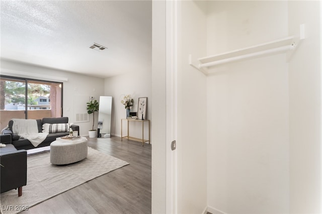 3151 Soaring Gulls Dr Unit 1021, Las Vegas, NV 89128 - living area with wood finished floors and baseboards