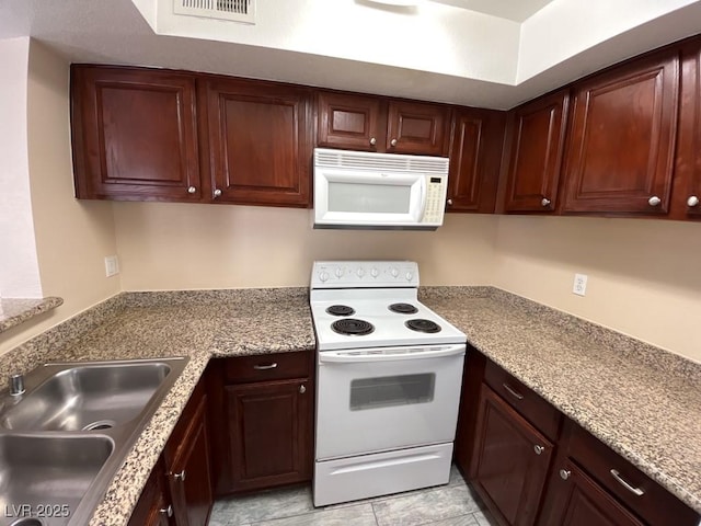 6800 E Lake Mead Blvd Unit 2024, Las Vegas, NV 89156 - kitchen with white appliances and a sink