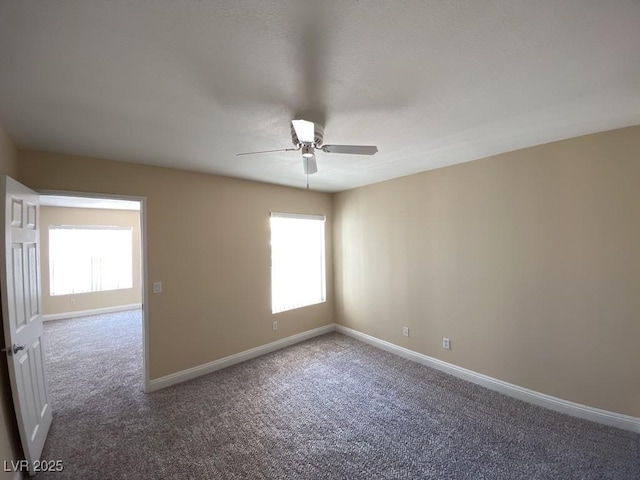 6800 E Lake Mead Blvd Unit 2024, Las Vegas, NV 89156 - spare room featuring ceiling fan, carpet, and plenty of natural light