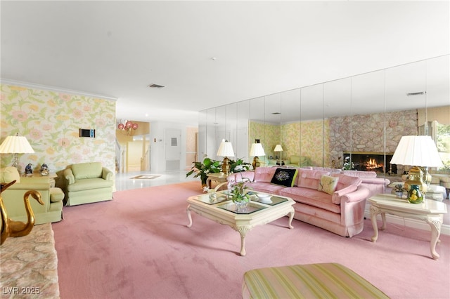 226 Dalmatian Ln, Las Vegas, NV 89107 - living room with wallpapered walls, carpet floors, and a fireplace