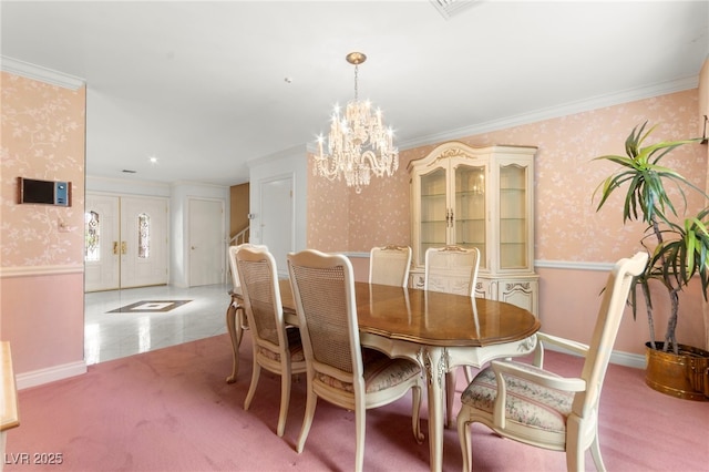 226 Dalmatian Ln, Las Vegas, NV 89107 - dining space with wallpapered walls, a chandelier, ornamental molding, stairway, and wainscoting