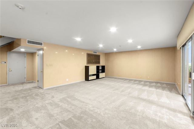 226 Dalmatian Ln, Las Vegas, NV 89107 - unfurnished living room featuring recessed lighting and light carpet
