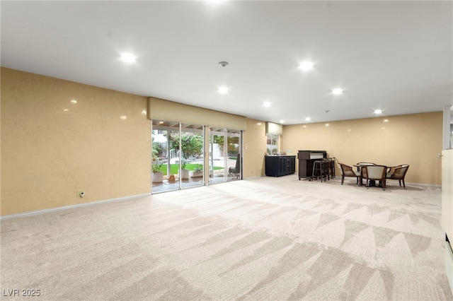 226 Dalmatian Ln, Las Vegas, NV 89107 - living area featuring light colored carpet and recessed lighting