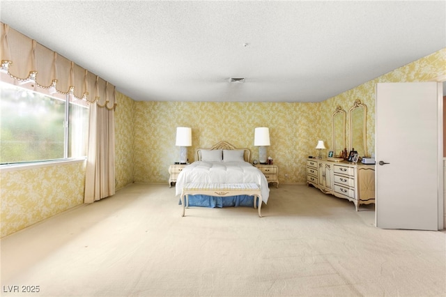 226 Dalmatian Ln, Las Vegas, NV 89107 - bedroom featuring wallpapered walls, light carpet, and a textured ceiling