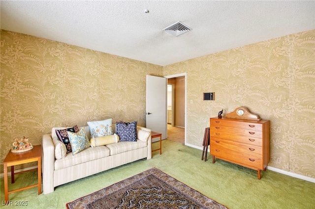 226 Dalmatian Ln, Las Vegas, NV 89107 - carpeted living room featuring a textured ceiling and baseboards