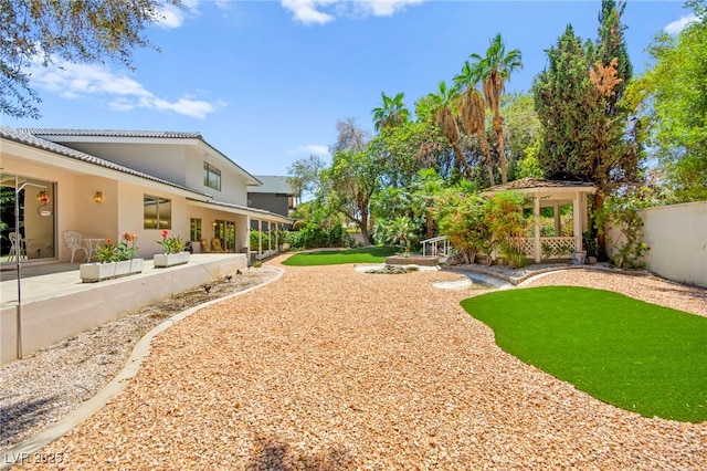 226 Dalmatian Ln, Las Vegas, NV 89107 - view of yard featuring a patio area
