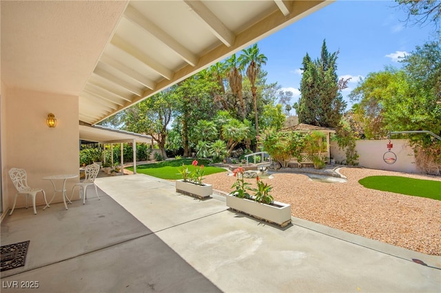 226 Dalmatian Ln, Las Vegas, NV 89107 - fenced backyard featuring a patio