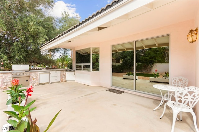 226 Dalmatian Ln, Las Vegas, NV 89107 - view of patio / terrace with an outdoor kitchen