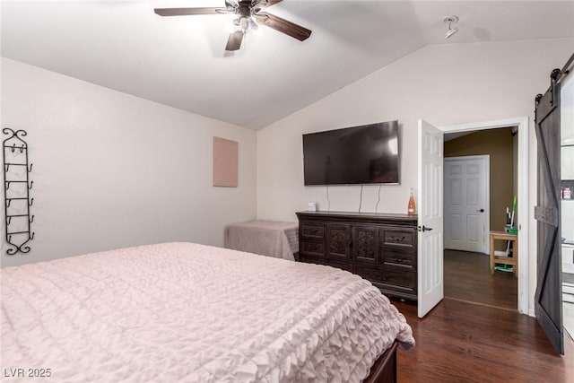 3825 Manhattan Bridge Pl, North Las Vegas, NV 89032 - bedroom with lofted ceiling, dark wood finished floors, a barn door, and ceiling fan