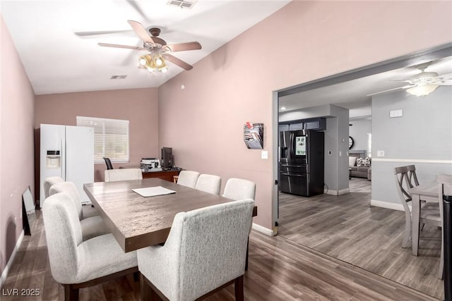 3825 Manhattan Bridge Pl, North Las Vegas, NV 89032 - dining area with ceiling fan, lofted ceiling, and wood finished floors