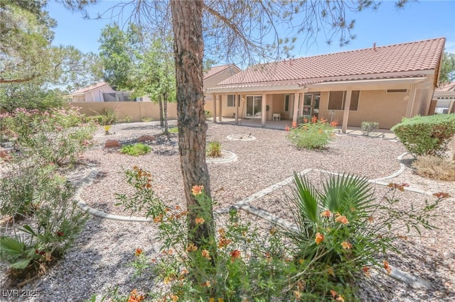1174 Monogram Way, Las Vegas, NV 89123 - rear view of property featuring a tile roof, a patio area, and stucco siding