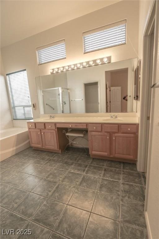 1174 Monogram Way, Las Vegas, NV 89123 - full bath featuring a stall shower, double vanity, a bath, tile patterned flooring, and a high ceiling
