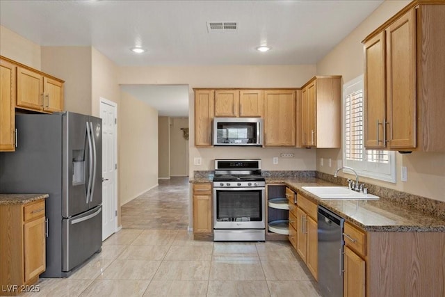 2117 Bay Thrush Way N, Las Vegas, NV 89084 - kitchen with appliances with stainless steel finishes and stone countertops