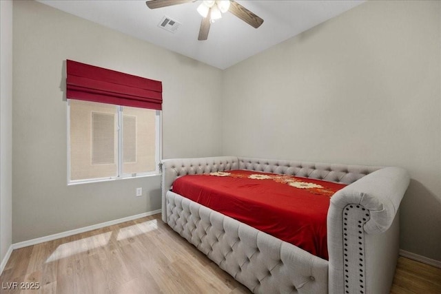 2117 Bay Thrush Way N, Las Vegas, NV 89084 - bedroom with wood finished floors and a ceiling fan
