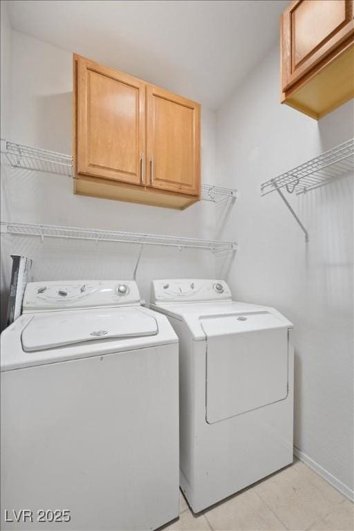 2117 Bay Thrush Way N, Las Vegas, NV 89084 - laundry room with cabinet space and washer and dryer
