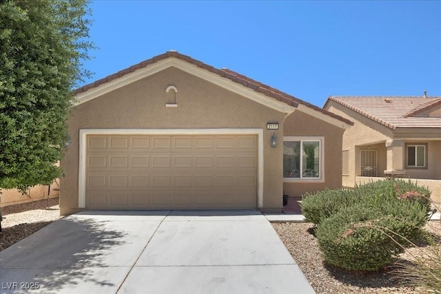 2117 Bay Thrush Way N, Las Vegas, NV 89084 - ranch-style house with stucco siding, driveway, and a garage
