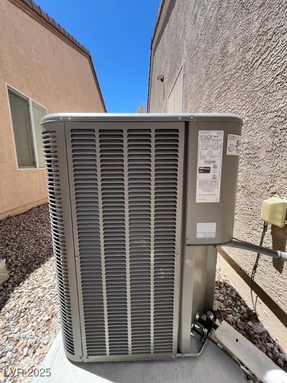 2117 Bay Thrush Way N, Las Vegas, NV 89084 - exterior view of a cooling unit and stucco siding