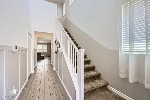 5606 Verde Valley Ct, North Las Vegas, NV 89081 - staircase with wood finished floors and baseboards