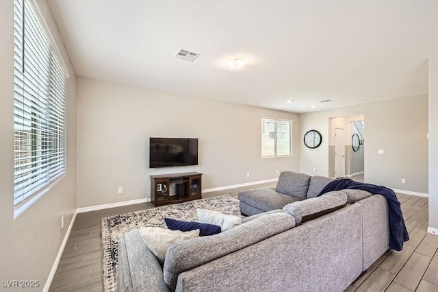 5606 Verde Valley Ct, North Las Vegas, NV 89081 - living area with baseboards and wood finished floors
