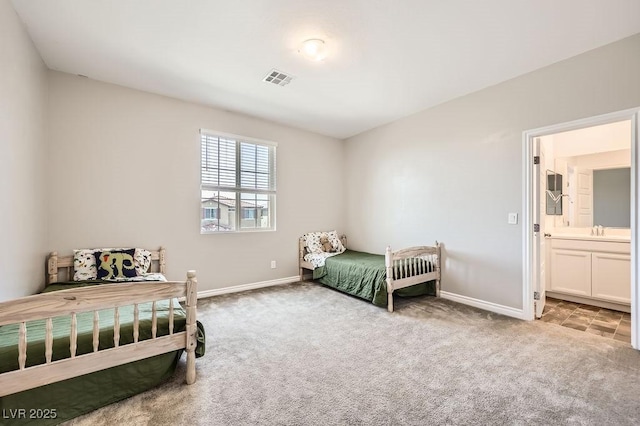 5606 Verde Valley Ct, North Las Vegas, NV 89081 - bedroom featuring carpet floors and ensuite bathroom
