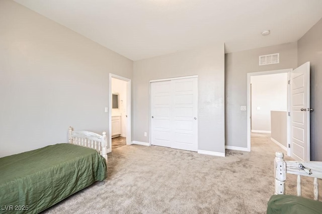 5606 Verde Valley Ct, North Las Vegas, NV 89081 - bedroom featuring carpet floors, ensuite bathroom, and a closet