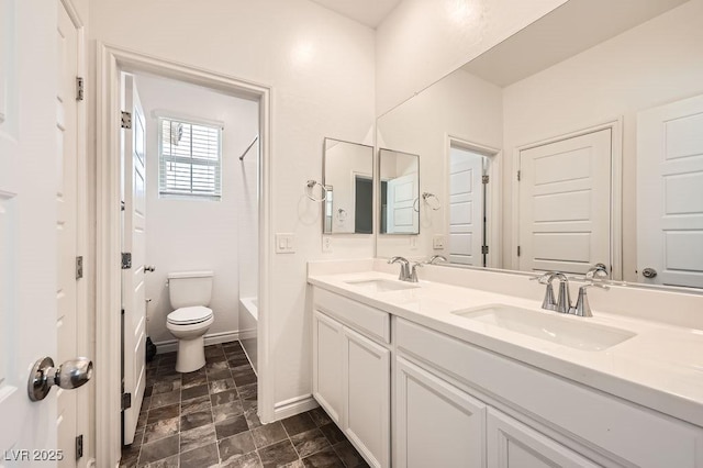 5606 Verde Valley Ct, North Las Vegas, NV 89081 - bathroom featuring double vanity,  shower combination, and stone finish flooring